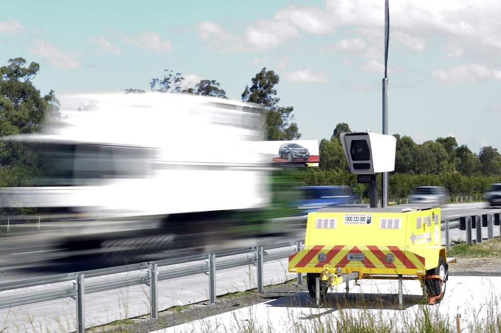 A mobile speed camera is seen on the M1 Motorway south of Brisbane, Monday, January 15, 2018. (AAP Image/Dave Hunt) 