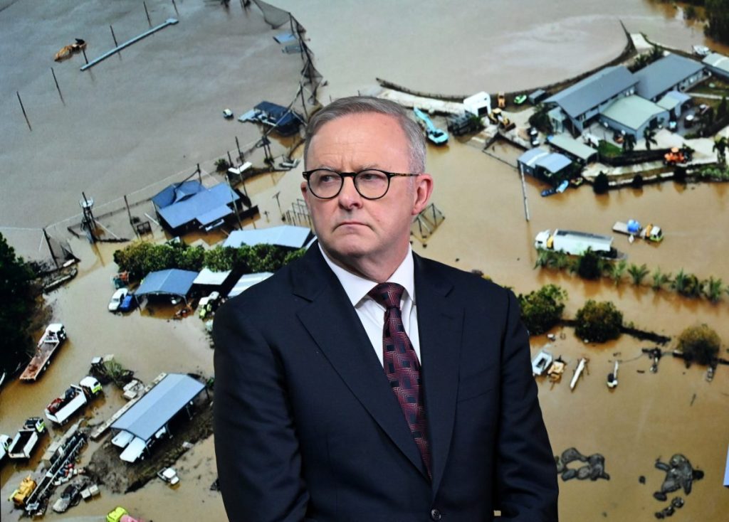 Australian Prime Minister Anthony Albanese speaks to the media during a press conference at the State Disaster Coordination Centre in Brisbane, Tuesday, December 19, 2023.  Two years after becoming Prime Minister, he warns that Australians are at risk of developing 'conflict fatigue. (AAP Image/Darren England) 