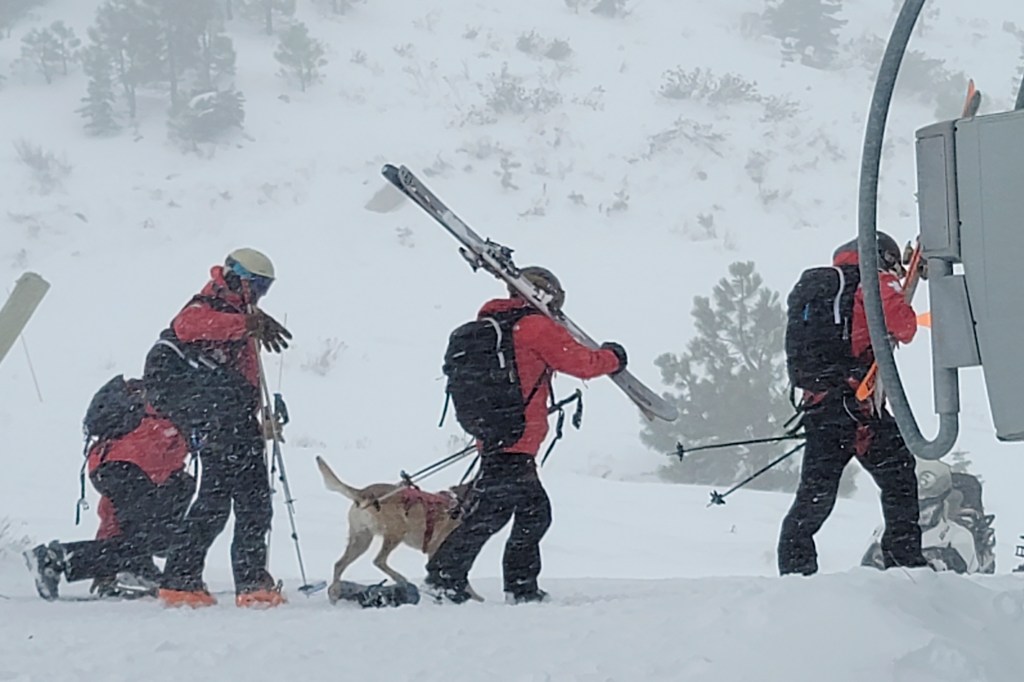 Rescues crews work at the scene of an avalanche at a California ski resort near Lake Tahoe on Wednesday, Jan. 10, 2024 in Calif. The avalanche roared through a section of expert trails at the ski resort, killing one person and injuring another, as a major storm with snow and gusty winds moved into the region, authorities said. (Mark Sponsler via AP)