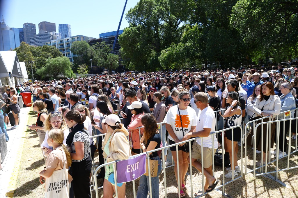 People line up to purchase Taylor Swift The Eras Tour merchandise at the Melbourne Cricket Ground in Melbourne, Thursday, February 15, 2024. Last-minute tickets for all of Taylor Swift's Melbourne and Sydney shows will go on sale, with restricted viewing seats costing $65.90. (AAP Image/Con Chronis) NO ARCHIVING
