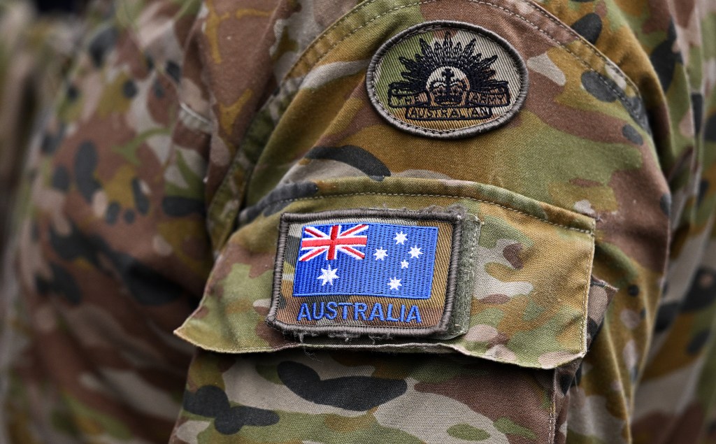 Detail of an Australian flag pictured on the uniform of Australian Army personnel on assignment to the Gold Coast, Tuesday, January 9, 2024.  (AAP Image/Dave Hunt) NO ARCHIVING