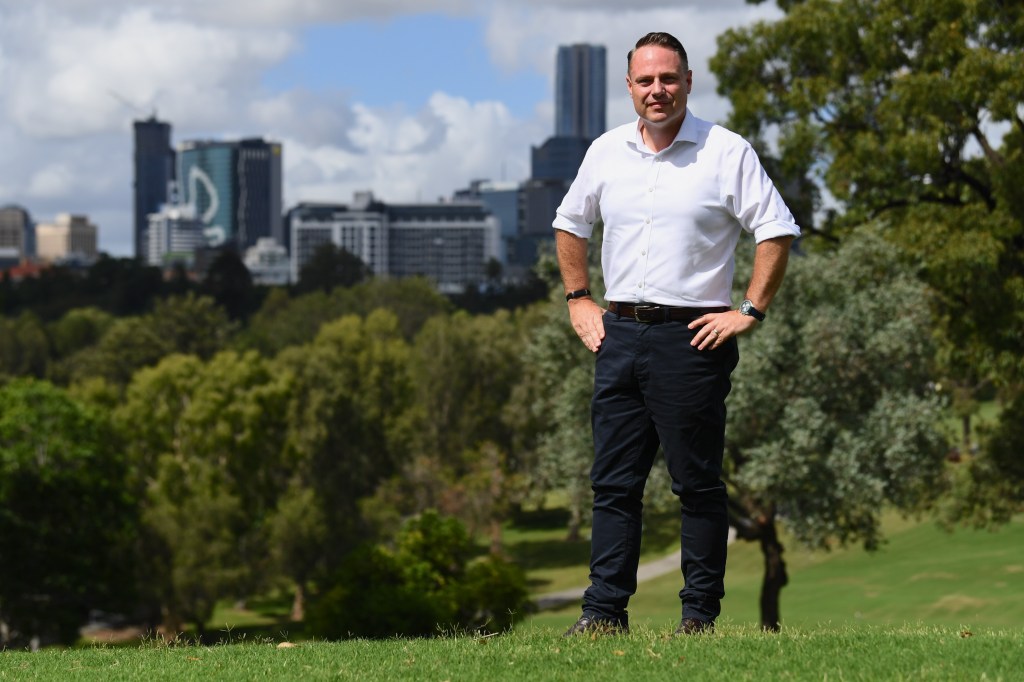 Brisbane Lord Mayor Adrian Schrinner poses for a photo during a press conference at Victoria Park in Brisbane. . (AAP Image/Jono Searle) 