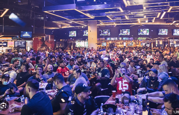 Hundreds of sports lover cram into a sports bar for their weekly fix. (Image: The Star).
