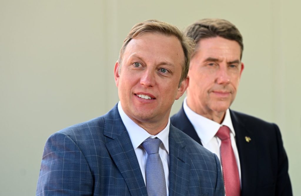 Queensland Premier Steven Miles (left) and Deputy Premier Cameron Dick (right) speaks to the media following the state cabinet meeting at Suncorp Stadium in Brisbane, Monday, March 18, 2024. Premier Steven Miles has rejected Graham Quirk’s Olympic Games’ venue review and has announced a plan to spend $1.6 billion on refurbishing the old QEII Stadium which held the 1982 Commonwealth Games at Nathan. (AAP Image/Darren England)