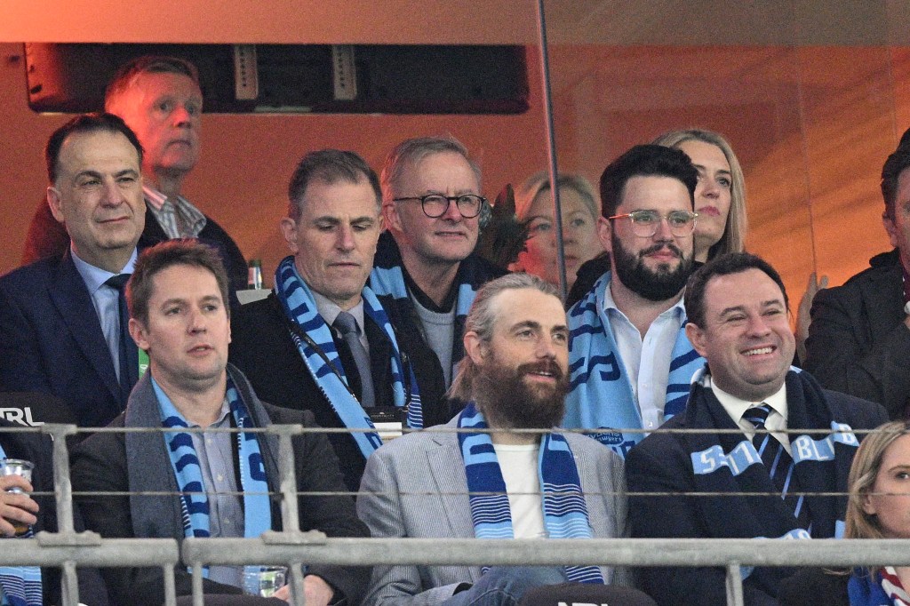 Prime Minister Anthony Albanese (centre, rear) watches on from the corporate boxes during Game 1 of the 2022 State of Origin series between the New South Wales Blues and the Queensland Maroons at Accor Stadium in Sydney, Wednesday, June 8, 2022. (AAP Image/Dan Himbrechts) NO ARCHIVING, EDITORIAL USE ONLY