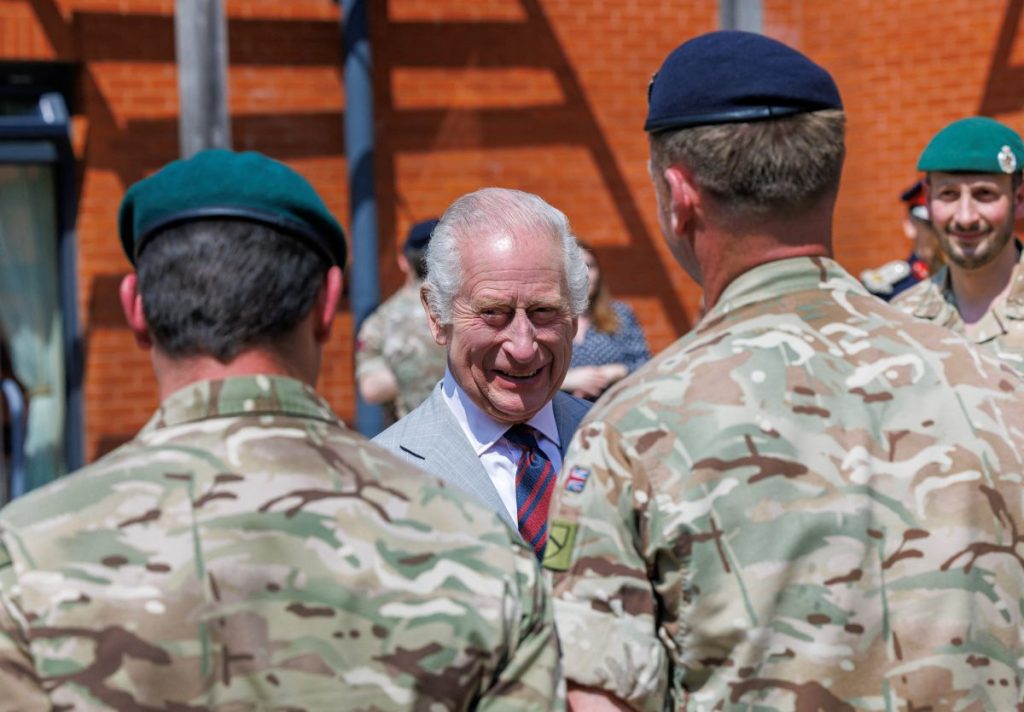Thumbnail for King in high spirits after being ‘allowed out of my cage’ for army visit