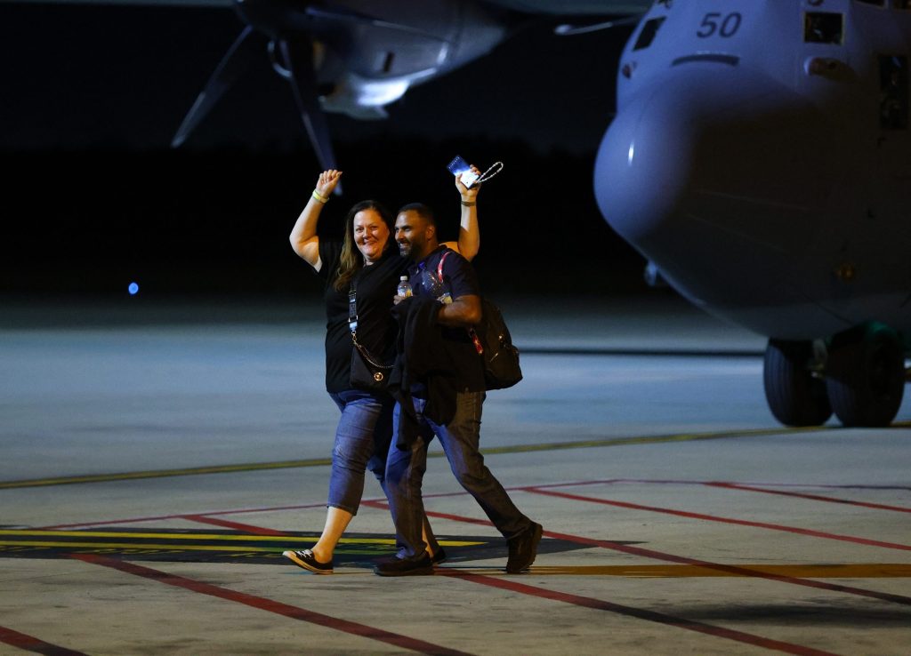 Thumbnail for Home safe on Queensland soil after a week caught up in island riots