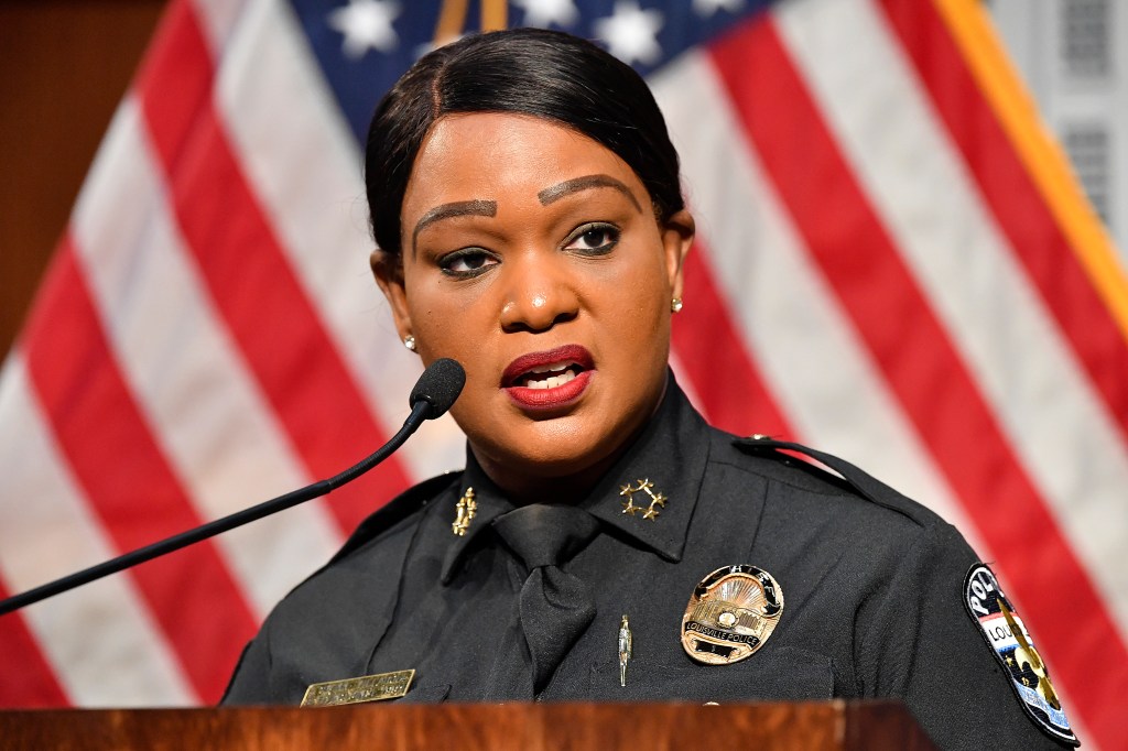 Louisville Metro Police Chief Jacquelyn Gwinn-Villaroel speaks to reporter during a press conference Thursday, May 23, 2024, in Louisville, Ky., regarding the arrest of PGA golfer Scottie Scheffler. The Kentucky police officer who arrested top-ranked golfer Scottie Scheffler outside the PGA Championship is receiving “corrective action” for failing to have his body-worn camera activated when he approached the golfer's vehicle — an interaction that police said resulted in the officer being dragged to the ground, authorities said Thursday. (AP Photo/Timothy D. Easley)