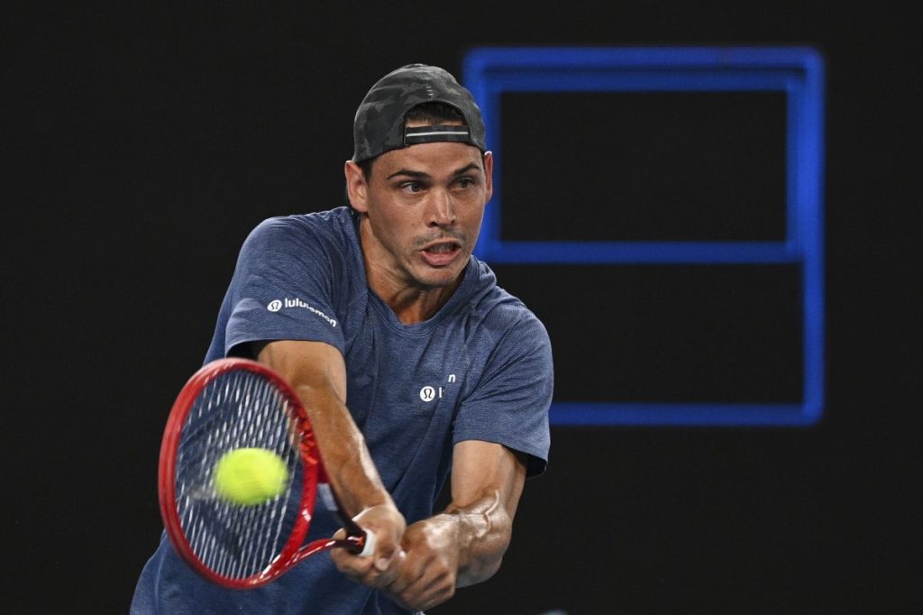 Alex Bolt of Australia in action during his second Round Men's singles match against Grigor Dimitrov of Bulgaria on Day 3 of the Australian Open at Melbourne Park in Melbourne, Wednesday, February 10, 2021. (AAP Image/Dean Lewins) NO ARCHIVING, EDITORIAL USE ONLY