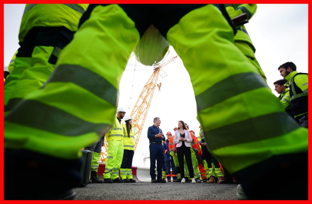 Labour leader Sir Keir Starmer being asked questions as he talks to workers during a visit to Hinkley Point nuclear power station in Somerset.  Ben Birchall/PA Wire