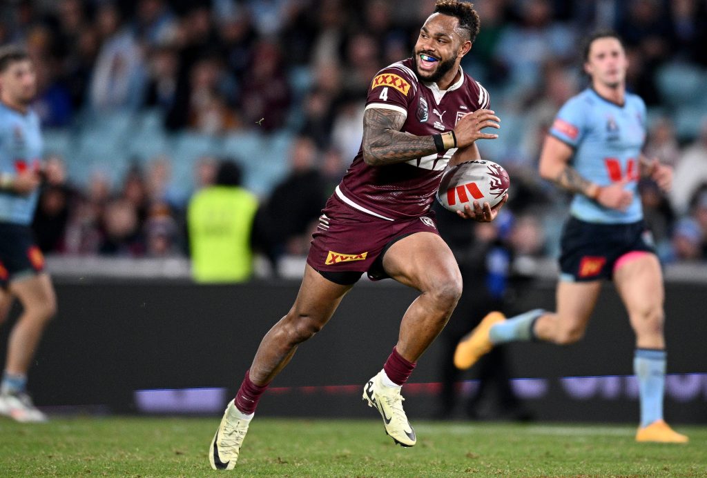 Hamiso Tabuai-Fidow of the Maroons makes a break to score a try during Game 1 of the State of Origin 2024 