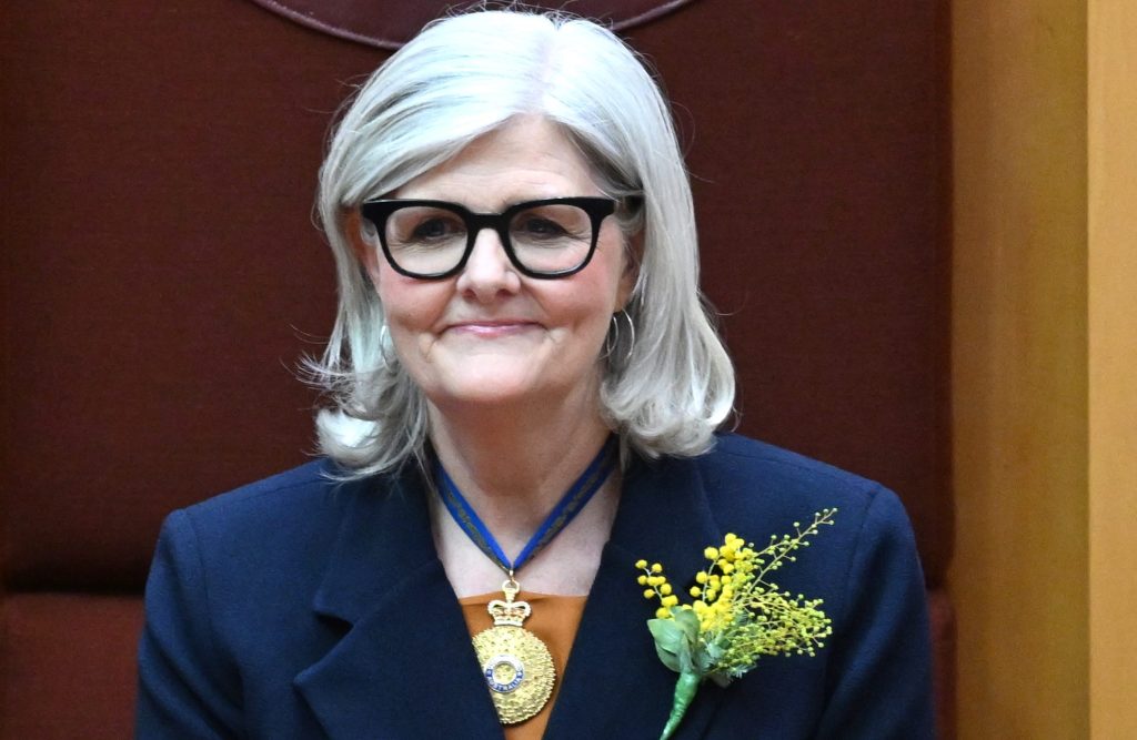 Incoming Governor-General of Australia Sam Mostyn reacts during the swearing in ceremony in the Senate chamber at Parliament House in Canberra, Monday, July 1, 2024. (AAP Image/Lukas Coch) 