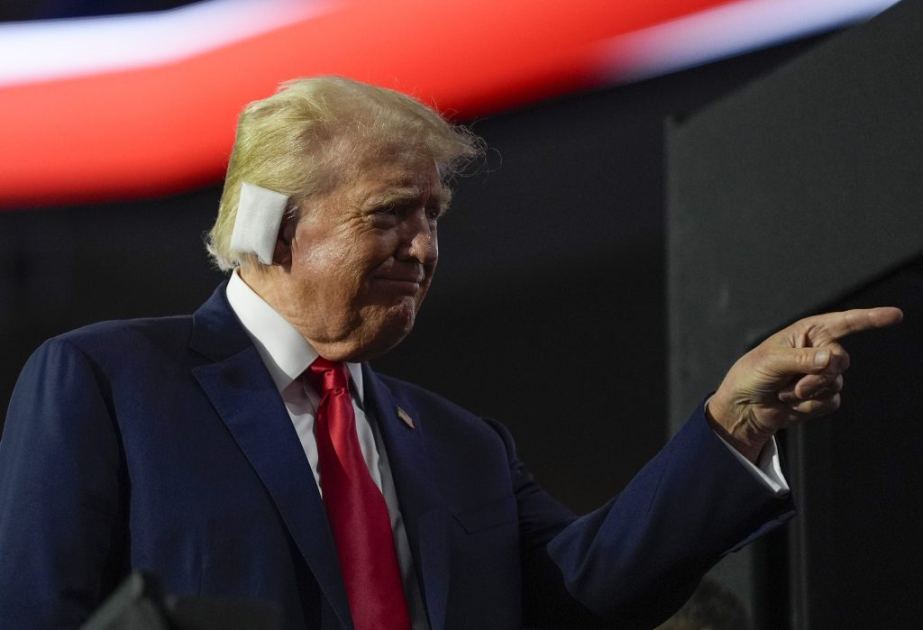 Thumbnail for Not exactly looking like a gunshot victim, a triumphant Trump makes grand entrance