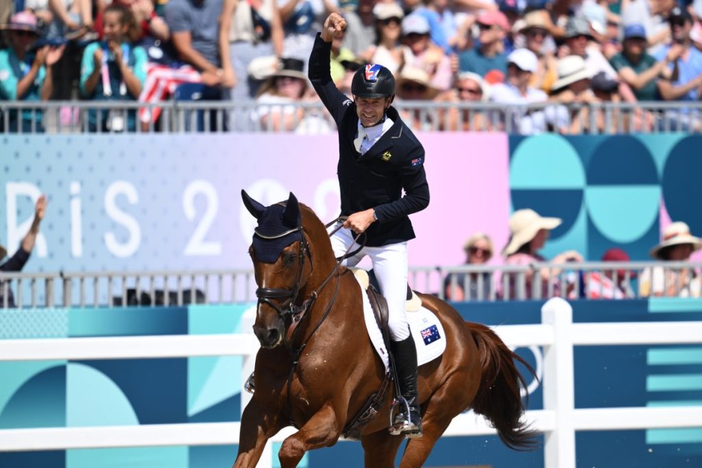 Christopher Burton of Australia after winning a silver medal in the Event Jumping Teams Final at Ch‰teau de Versailles as part of the 2024 Paris Summer Olympic Games in Paris, France, Monday, July 29, 2024. (AAP Image/Joel Carrett) NO ARCHIVING