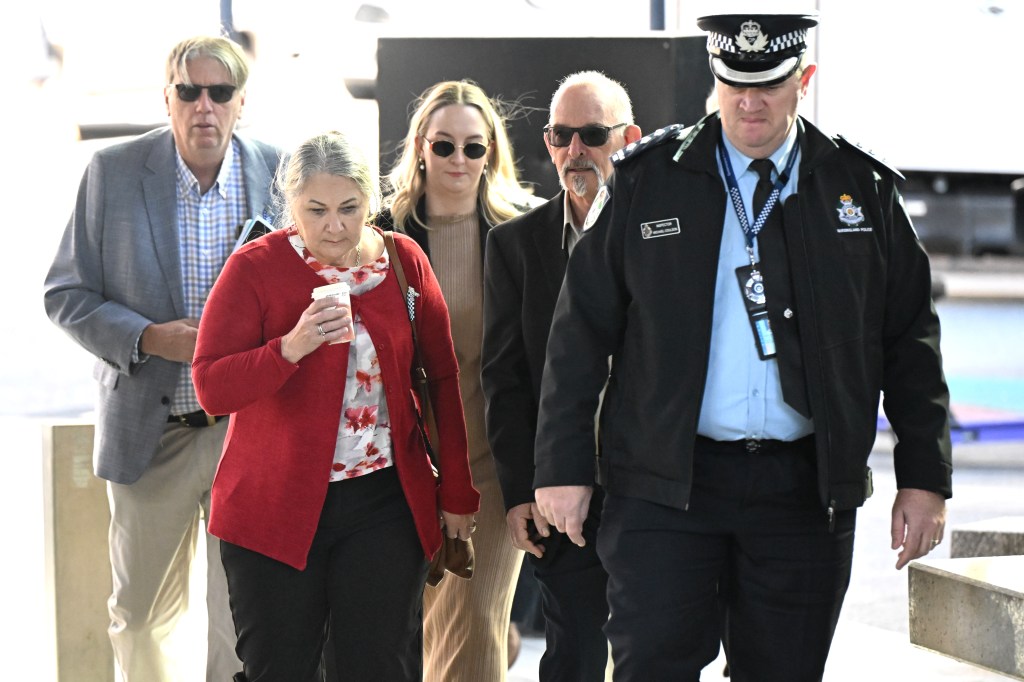 The families of Constables Matthew Arnold and Rachel McCrow are seen arriving at the Brisbane Coroners Court in Brisbane, Wednesday, July 31, 2024. Rachel McCrow and Matthew Arnold were two police officers who were killed at a Wieambilla property in 2022. (AAP Image/Darren England) NO ARCHIVING