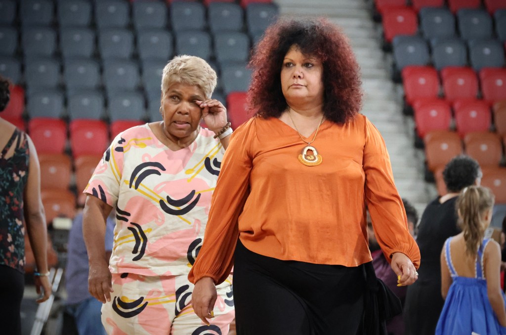 NT federal Senators Malarndirri McCarthy and Marion Scrymgour during the state funeral of Indigenous rights activist Dr Bush-Blanasi. (AAP Image/Neve Brissenden) 