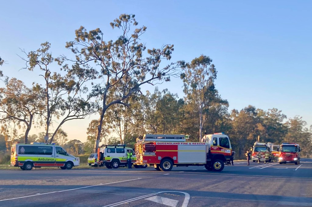 A supplied image shows the scene of a crash between a truck and a ute on the Bruce Highway in Bororen, north of Brisbane, Friday, August 30, 2024. One person is fighting for life after a serious crash between a chemical carrying truck and a ute north of Brisbane. (AAP Image/Supplied by Queensland Ambulance Service) 