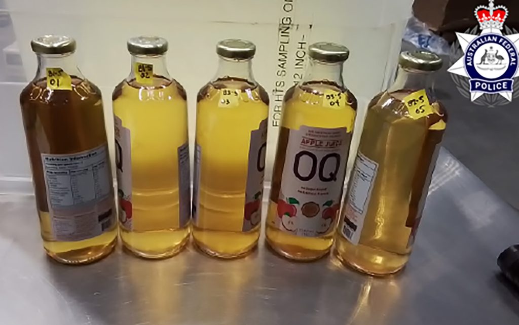 A supplied image obtained on Tuesday, September 17, 2024, of bottles of juice that were intended to conceal methamphetamine during an alleged importation plot to Australia. (AAP Image/Supplied by AFP) NO ARCHIVING, EDITORIAL USE ONLY