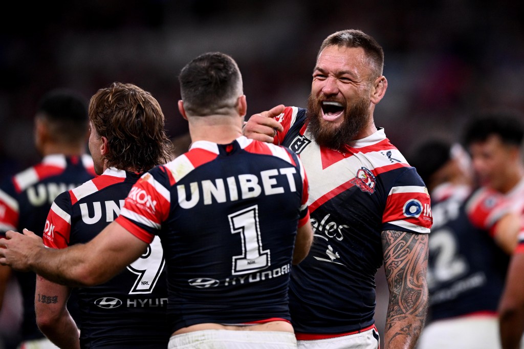 Jared Waerea-Hargeaves of the Roosters (right) celebrates with James Tedesco during the NRL Semi Final match between the Sydney Roosters and the Manly Sea Eagles at Allianz Stadium in Sydney, Saturday, September 21, 2024. (AAP Image/Dan Himbrechts) NO ARCHIVING, EDITORIAL USE ONLY
