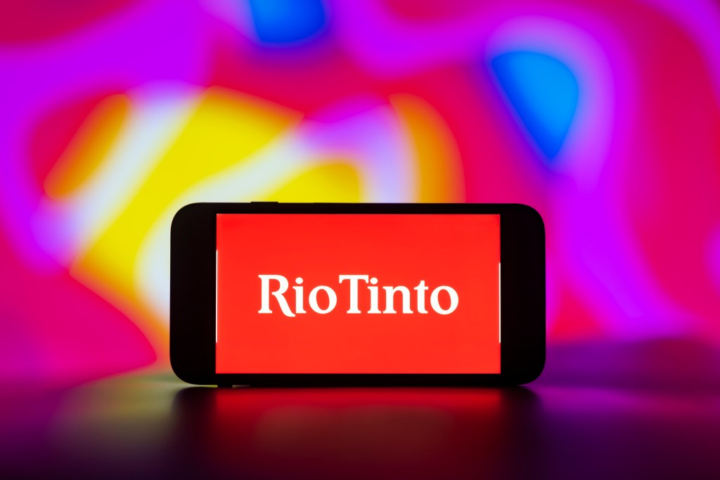 In this photo illustration, the Rio Tinto logo is seen displayed on a mobile phone screen. (Photo by Idrees Abbas / SOPA Images/Sipa USA) *** Strictly for editorial news purposes only ***